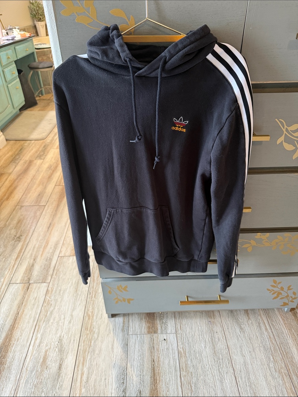 adidas Black Hoodie with White Sleeve Stripes and Small Trefoil Accent